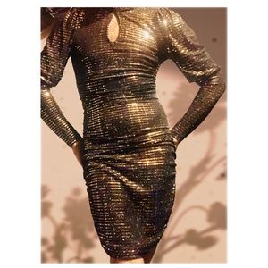 Hand made black cocktail/party dress adorned with copper coloured sequins.